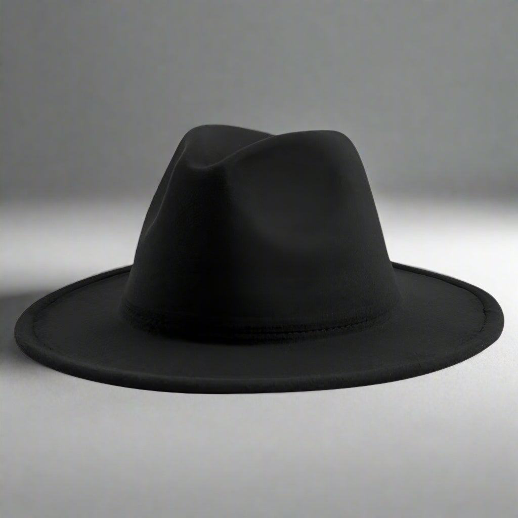 Vegan felt fedora hat, four colours. All hats are adjustable. The hats come with a matching cotton decorative belt. This wide brimmed boater hat is crafted from a cotton and polyester blend, so cruelty free to animals, and the hats are made in a small studio in China, where staff are paid well and work in a safe place.