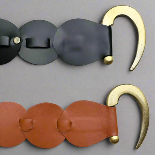 Two vegan leather belts with gold-colored hooks, one black and one brown, displayed flat.