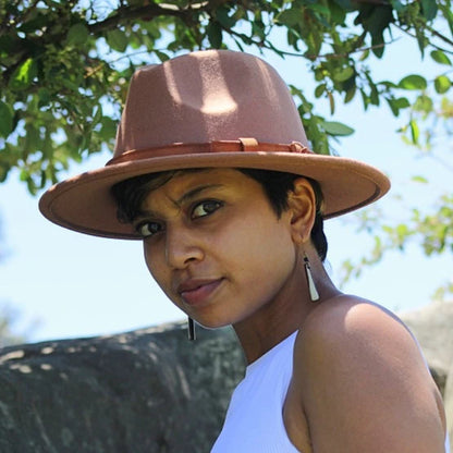 Vegan felt fedora hat, four colours. All hats are adjustable. The hats come with a matching cotton decorative belt. This wide brimmed boater hat is crafted from a cotton and polyester blend, so cruelty free to animals, and the hats are made in a small studio in China, where staff are paid well and work in a safe place.