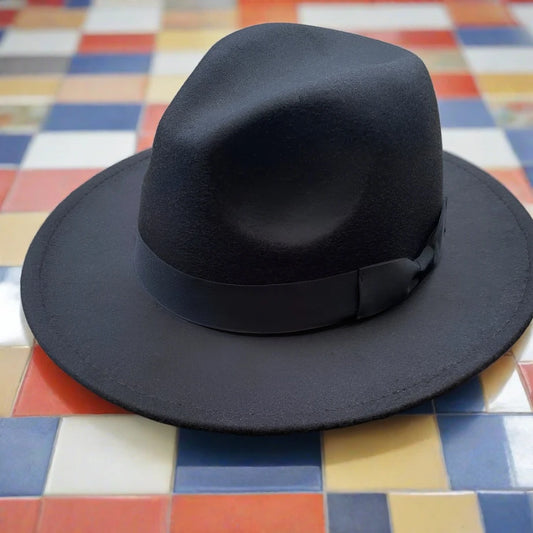 Vegan felt fedora hat, four colours. All hats are adjustable. The hats come with a matching cotton decorative belt. This wide brimmed boater hat is crafted from a cotton and polyester blend, so cruelty free to animals, and the hats are made in a small studio in China, where staff are paid well and work in a safe place.