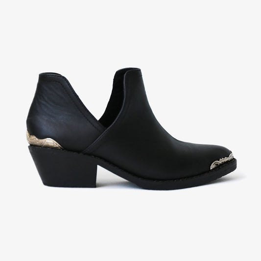 A classic western look, our best-selling Lotus ankle calf booties are a simple yet statement piece, made from high-quality vegan faux leather finished with metal silver heel and toe caps. Our shoes are handmade in Bali using vegan fabric and vegan glue. Vegan Shoes Australia Women's vegan shoes Vegan boots women cowboy
