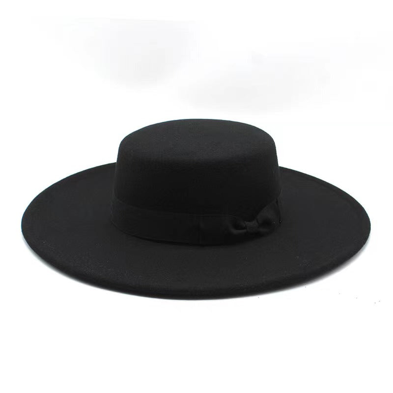Vegan felt Boater hat, four colours. All hats are adjustable. The hats come with a matching cotton decorative belt. This wide brimmed boater hat is crafted from a cotton and polyester blend, so cruelty free to animals, and the hats are made in a small studio in China, where staff are paid well and work in a safe place.