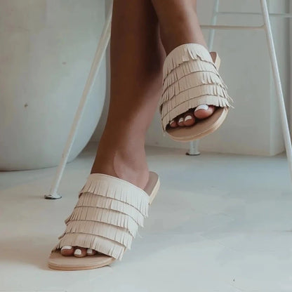 Vegan shoes for women. Vegan Slide sandals in a natural colour, sand / cream. Small business vegan shoes sydney australia melbourne adelaide perth tasmania brisbane. Fast delivery. Fringed slides boho style sandals.