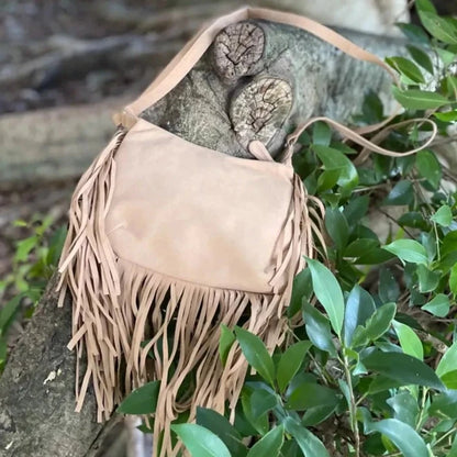 Vegan handbag for women, shoulder crossbody bag with tassels fringing. This fringed tassel bag is handcrafted in Bali using soft microfibre eco-friendly vegan suede.