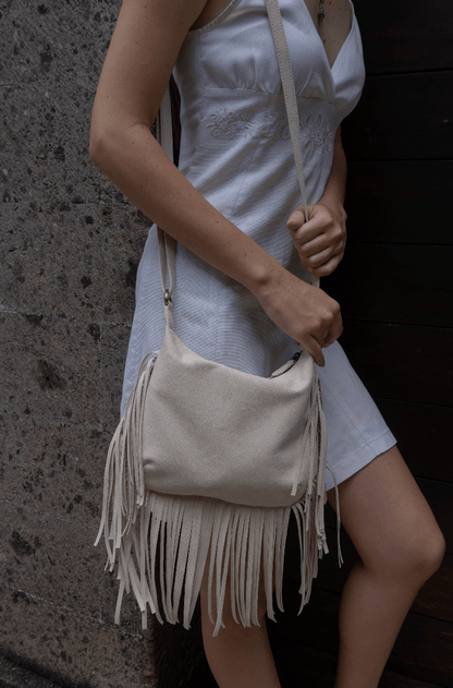 Vegan handbag for women, shoulder crossbody bag with tassels fringing. This fringed tassel bag is handcrafted in Bali using soft microfibre eco-friendly vegan suede.